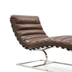 a brown leather chaise lounge chair with chrome legs and footrests on a white background