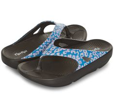 Embrace the summer vibes with Floopi's Blair Printed Comfort Thong Sandal, a perfect blend of style and comfort for your warm-weather adventures. These lightweight sandals are not only ideal for travel but also offer arch support technology to alleviate foot pain, ensuring you can enjoy your day to the fullest. From beach outings to casual strolls, the Blair Printed Sandal is your go-to footwear choice this season. From Floopi. Summer Outdoor Flip Flops With Arch Support, Beach Season Sport Sandals With Arch Support For Vacation, Vacation Sport Sandals With Arch Support For Beach Season, Arch Support Flip Flops For Beach Vacation, Comfortable Arch Support Flip Flops For Beach Season, Ergonomic Sandals For Summer Beach, Ergonomic Sandals For Beach In Summer, Fitness Jewelry, Pool Shoes