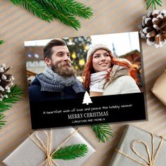 a christmas card with an image of a man and woman