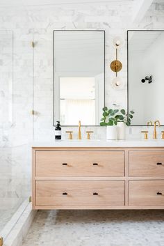 the instagram page on instagram shows an image of a bathroom with two sinks and mirrors