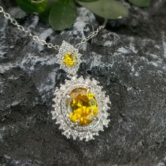 ✰ This delicate lab-created yellow gemstone pendant is perfect for people who want to achieve a brilliant and splendid look ✰  Not only for everyday wear, this yellow minimalist necklace is also great for weddings and also as a bridesmaid ring ✰ This yellow gem necklace with halo is a very special gift for birthday, Mother's Day, bridesmaids, Valentine's Day and more  ✰ Comes with an exquisite gift box We also offer the ring and earring from the same collection : https://www.etsy.com/listing/1208051426/yellow-zircon-ring-with-halo-oval-ring https://www.etsy.com/listing/1208045812/yellow-oval-zircon-earring-yellow-zircon Materials: Environmentally-friendly brass Quantity: 1 Pendant with chain Main Gemstone Size: 0.47 x 0.4 in ----♛ PRODUCTION & SHIPPING ♛ --- ✰Multiple items purchased in on Luxury Yellow Round Pendant Necklace, Elegant Oval Citrine Necklaces, Yellow Pendant Jewelry For Wedding, Elegant Yellow Birthstone Necklace, Oval Pendant Birthstone Jewelry In Cubic Zirconia, Yellow Round Pendant Necklace As Gift, Yellow Round Pendant Necklace For Gift, Elegant Citrine Oval Pendant Jewelry, Elegant Citrine Oval Pendant Necklace