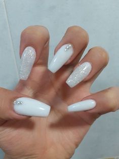 Nail Ideas White Coffin, French Tip Acrylic Nails 2023, White Nails With N Initial, Classy Birthday Acrylic Nails, White And Rhinestone Nails, White And Silver Nails Coffin, Cute Nails For Birthday White, Nail Ideas For Prom White, White Acrylics With Glitter