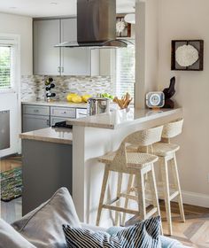 the kitchen is clean and ready to be used as a living room or dining area