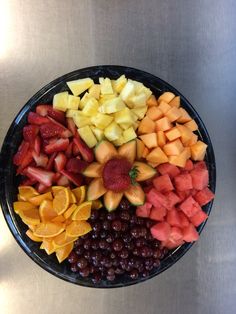 a bowl filled with lots of different types of fruit