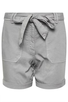 Looking to expand your wardrobe this summer We've got you covered. Made from a comfortable cotton blend fabric, these petite fit cargo shorts feature button and zip fastening, a tie belt and four functional pockets. Simply style with trainers for an on-trend casual look. Grey Cargo Shorts, Cargo Shorts Women, Tall Fashion, Petite Jumpsuit, Petite Coat, Petite Shorts, Shorts Cargo, Cotton Blend Fabric, Fashion Face