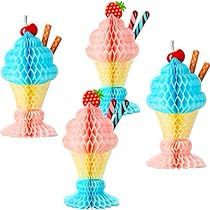 four ice cream cones with strawberries and cherries on top are in the shape of cupcakes