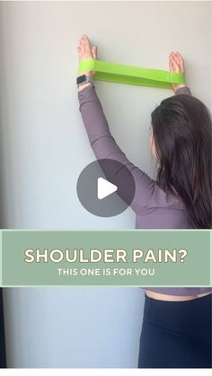 a woman holding up a green piece of tape with the text shoulder pain? this one is for you