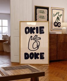 there is a sign that says okie doke in black and white on the wall