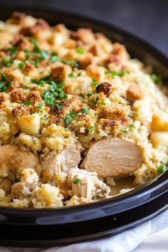 chicken and stuffing casserole in a black bowl