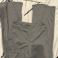 Never Worn Casual Gray Elastane Activewear, Basic Fitted Loungewear Pants, Casual Wide Leg Leggings For Loungewear, Casual Wide Leg Stretch Leggings, Casual Gray Elastane Leggings, Casual Stretch Gray Yoga Pants, Casual Gray Stretch Yoga Pants, Fitted Cotton Casual Leggings, Fitted Cotton Leggings Casual Style