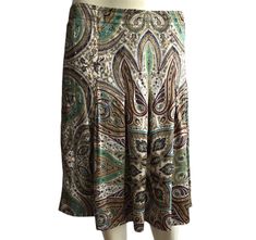 "Gorgeous Mark Aurel 100 % silk midi skirt in paisley pattern . Labeled as size 40, fits like L . The skirt is pinned to the mannequin . Could be worn hight waist or low waist depend on your measurements . Waist 88 cm / 34\", length 58 cm / 22,8\". Perfect condition" Long Paisley Print Skirt, Flowy Long Paisley Print Skirt, Long Flowy Skirt With Paisley Print, Flowy Long Skirt With Paisley Print, Fitted Long Skirt With Paisley Print, Elegant Fitted Paisley Print Skirt, Designer Skirt, Silk Midi Skirt, Skirt Y2k