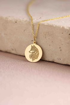 Gold Wolf Pendant - howling Gold Necklace ● Material of pendant: Solid Gold 14k ( REAL GOLD ) ● Metal Stamp: 14k ( REAL GOLD ) ● The pendant is available in 5 sizes: - 12,7 mm / 0.5 inches (Diameter) - 14,0 mm / 0,55 inches ( Diameter ) In the photos - 15,3 mm / 0.6 inches ( Diameter ) - 16,5 mm / 0,65 inches ( Diameter ) - 19,1 mm / 0,75 inches ( Diameter ) ( In the photos the size is 14mm / 0.55 inches Diameter ) ( Jump Ring inner diameter: 4 mm ) ● Material of chain: Solid gold 14k ( REAL GOL Sterling Silver Wolf Design Jewelry Gift, Sterling Silver Jewelry With Wolf Design For Gift, Round Wolf Design Jewelry Gift, Wolf Design Round Jewelry Gift, Sterling Silver Wolf Design Necklace As Gift, Sterling Silver Necklace With Wolf Design As Gift, Sterling Silver Necklace With Wolf Design For Gift, Wolf Pendant, Wolves Pendants