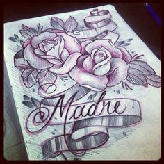 a rose tattoo with the word made on it