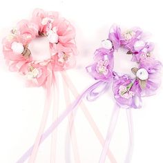 Using exquisite white and pink flowers, combined with delicate sheer and satin ribbon, this elegantly hand-crafted floral bunring is a stunning addition to any space. With a thoughtfully designed combination of crisp white and delicate pink flowers, paired with sheer and satin ribbon, this hand-crafted floral bunring adds an elegant touch to any room. Lyrical Shoes, Flamenco Shoes, White And Pink Flowers, Ballet Bun, Ballet Pointe Shoes, Mask Dance, Leotard Fashion, Ballroom Shoes, How To Make Ribbon