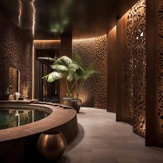 an indoor spa area with a large plant in the center and carved screens on the walls