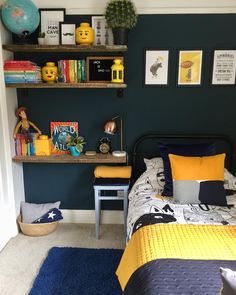 a bed room with a neatly made bed and shelves