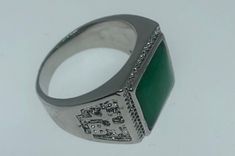 Large green nephrite jade Ornate German Silver Vintage ring, does not tarnish, NOT sterling Has Chinese lettering for luck on the sides. Sizes 8, 9 10 or 11 All rings are shipped in a nice gift box. Check out our over a THOUSAND great reviews Engraving is $4 per letter and is not always perfect depending on the piece. It can take a few days if the jeweler is busy. This is payable to Paypal Judithsltd@gmail.com Green Rectangular Signet Ring For Formal Occasions, Classic Green Signet Ring For Gift, Formal Green Engraved Signet Ring, Classic Green Signet Ring Stamped 925, Classic Green Emerald Ring Stamped 925, Classic Green Engraved Signet Ring, Green Gemstone Engraved Ring Gift, Green Gemstone Engraved Ring For Gift, Green Hallmarked Signet Ring As Gift