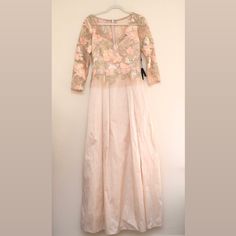 Nwt Adrianna Papell Pale Peach Gold Floral 3/4 Sleeve Dress W/ Taffeta ***Note Loose Threads On Back In Last Photo Embroidered Metallic Tread, On Mesh Overlay 3/4 Sleeve Top Over Full A-Line Taffeta Dress Full Taffeta Skirt ****Does Not Include Belt*** Style- Ap1e203037-Pale Peach Multi Spring A-line Dress For Mother Of The Bride, Mother Of The Bride Half Sleeve Dresses For Spring, Summer Wedding Dresses With 3/4 Sleeves, Pink 3/4 Sleeve Evening Dress, Half Sleeve Dresses For Spring Wedding Guests, Pink Half-sleeve Evening Dress, Summer Formal Long Sleeve Mother Of The Bride Dress, Spring Mother Of The Bride Dress With 3/4 Sleeves, Half Sleeve Dresses For Wedding Guests In Spring