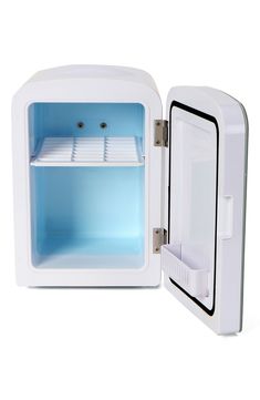 an open white mini fridge on a white background