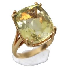 Stunning 14k Yellow Gold light green citrine ring. Approximately 10.22 Grams TW. The dimensions are approximately 10.2 mm x 15mm. Approximately 9 carats. Marked 14k. Approximate size 7.5. Green Citrine, Citrine Ring, Gold Light, Cocktail Ring, Cocktail Rings, Mirror Table, Citrine, Light Green, Gemstone Rings