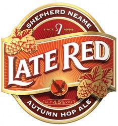 the label for late red ale is shown in gold and red, with two hops on