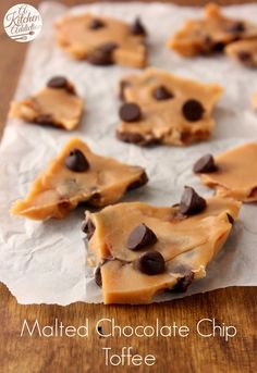 chocolate chip toffee is cut in half and placed on top of parchment paper