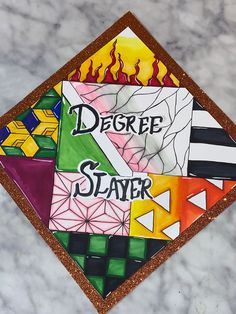 there is a painting on the wall that says degree slayer and fire in it's center