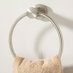 a towel ring is mounted on the wall