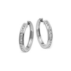 Add shine to any outfit  no matter the occasion  with these gorgeous hoop earrings. They feature natural diamonds in a sleek and secure 14-karat white gold channel setting. Step Parenting, Channel Setting, Step Kids, Channel Set, Natural Diamonds, Matter, Hoop Earrings, Diamonds, White Gold