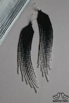 These black gray and silver seed bead earrings are made of high-quality Czech beads and strong synthetic thread. They are elegant, fashionable, and highly versatile, suitable for everyday wear. Features: Sterling silver components Color: black, gray, silver. This item is currently in stock. You must be completely satisfied. If you find merchandise unsatisfactory for any reason, return it within 10 days and your money will be refunded without questions. More beaded earrings http://etsy.me/2ycItdb Gray Chandelier, Artistic Earrings, Beige Earrings, Evening Earrings, Animal Print Earrings, Ombre Earrings, Soldering Jewelry, Beautiful Beadwork, Grey Beads