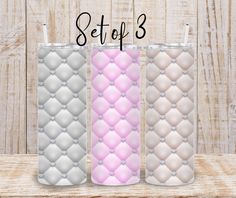 three pink and white diamond patterned tumbles with the words set of 3 on them