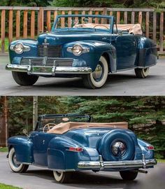 an old blue car parked in front of a wooden fence next to another classic car