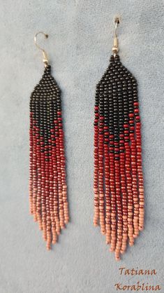 These handmade earrings are made of high-quality Czech beads and strong synthetic thread. They are elegant, fashionable, and highly versatile, suitable for everyday wear. Color: black,brown . 100% hand made with love! Measurements: Length-about 11.5cm (4.33 inch) Width -about 2 cm (0.79 inch) Materials: Sterling silver components Czech glass beads Nylon Thread Handwoven Black Drop Earrings, Black Handwoven Drop Earrings, Elegant Handwoven Black Beaded Earrings, Elegant Black Handwoven Beaded Earrings, Handwoven Black Earrings For Gifts, Black Handwoven Dangle Jewelry, Handwoven Black Jewelry With Round Beads, Black Handwoven Round Beads Jewelry, Black Chandelier Earrings With Colorful Beads As Gift