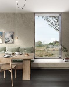 a living room filled with furniture next to a large window covered in windowsills