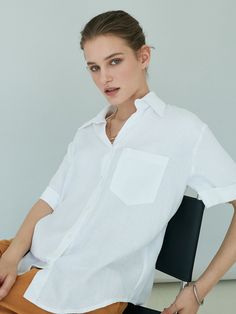 Editor's NotesOUIE's pure linen shirt has a natural and cozy mood. You can wear it with any jeans or skirt as a daily look.- One pocket on the chest- Breathable and cool fabric- Mother of pearl buttons- Open collar- Roll up sleevesMeasurement (inch)One size- Shoulder: 14.17 in.- Bust: 24.01 in.- Sleeve length: 8.66 in.- Total length: 26.37 in.* Model info: Height: 5'8, Bust: 31in. , Waist 22.83 in., Hip 34.64 in. Fitting size:SComposition & Care - 60%Tencel, 40%Linen- Hand wash with cold water/Dry cleaning- Do not use washing machineDesigner- by OUIE White Relaxed Fit Blouse With Rolled Sleeves, White Relaxed Fit Blouse With Pockets, White Blouse With Rolled Sleeves In Relaxed Fit, White Shirt For Summer Casual Gatherings, Relaxed Linen Shirt With Pockets, White Tops With Pockets For Casual Gatherings, Chic White Shirt With Pockets, Casual Linen Blouse With Pockets, White Linen Shirt With Pockets