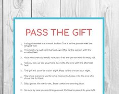 a sign that says pass the gift on a wooden background with blue trimmings