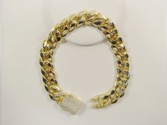 18k gold filled monaco cuban link bracelet great for men and ladies 12mm width 8 inch length great gold color finish high quality attractive look looks exactly like real gold come in nice gift box make it perfect gift for any occasion Yellow Tones, Gold Gold, Cross Charms, Real Gold, Colour Tone, Link Bracelets, Gold Filled, Gold Color, Choker Necklace