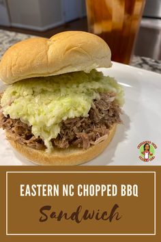 a sandwich on a plate with the words eastern chopped bbq sandwich