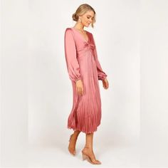 Petal & Pup Long Sleeve Satin Pleated Pink Midi Be The Centre Of Attention In This Cocktail-Ready Midi Dress! This Showstopper Features A V Neckline And Long Sleeves With Elasticised Cuffs For A Feminine Yet Flattering Silhouette. A Back Neck Opening With Button Close And Front Twist Knot On Bust Add The Perfect Finishing Touches. Midi Length V Neckline Long Sleeves With Elasticised Cuff Back Neck Opening With Button Close Front Twist Knot On Bust Back Invisible Zip Fine Pleat A-Line Skirt Desig Long Sleeve Satin Dress, Black Cotton Dresses, One Shoulder Midi Dress, Midi Sundress, Halter Midi Dress, Twist Knot, Tie Dye Dress, Pleated Midi Dress, Satin Midi Dress