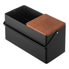 a black box with a wooden lid