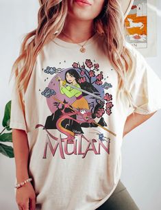 Vintage Mulan 1998 Shirt Pop Culture Short Sleeve T-shirt For Spring, Character Print T-shirt For Spring Streetwear, Summer Pop Culture Crew Neck Shirt, Spring Crew Neck Shirt With Character Print, Graphic Print T-shirt For Spring Fan Apparel, Spring Pop Culture T-shirt With Letter Print, Retro Character Print T-shirt For Spring, Spring Fan Merchandise T-shirt, Spring Fan Apparel Tops