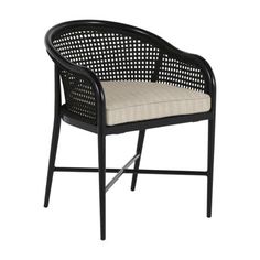 an outdoor chair with black frame and beige cushion