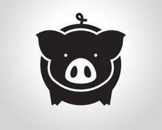 a pig's head is shown in black on a light gray background with the words,