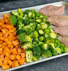 broccoli, carrots and other vegetables on a tray