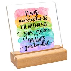 an acrylic sign that says never underestimite the difference you make and the lives you touched