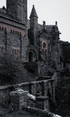 an old castle is shown in black and white