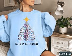 Looking for a unique funny holiday gift for your orthopedics, physio or Chiropractic professional or Chiropractor? Look no further than our Skeleton spine Christmas tree Chiropractor shirt! This humorous and stylish Christmas lights shirt is perfect for any chiropractor student or chiropractor assistant, or any medical professional that has a particular specialty and interest in the back bone.  Whether you're celebrating their graduation, giving them a funny gift, or just showing your support, t Chiropractor Student, Chiropractor Assistant, Spine Shirt, Skeleton Christmas Tree, Skeleton Spine, Chiropractor Gifts, Skeleton Christmas, Office Shirt, Funny Holiday