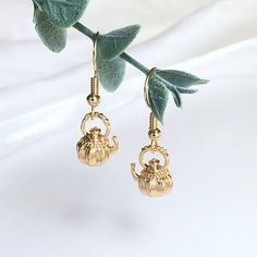 👂PRODUCT DETAILS Tiny 3D Teapot Earrings by ELEVEN11DREAM - Material: 18k gold plated - Size: Length 0.98in. /Drop Length 0.39 in. /width0.39in.     Length 2.5cm /Drop Length 1cm /width1cm - Sold in pairs 🎈SHIPPING - All orders will be shipped within 1-3 business days after the order has been received - Ship all orders via USPS First-Class Mail - Enjoy free U.S. domestic shipping on orders over $20 with the code: FREE SHIPPING 💖PLEASE READ THE PRODUCT DESCRIPTION - All products are made by my Teapot Earrings, Tea Jewelry, Tee Party, Party Earrings, Earrings Unique, Unique Gifts For Her, Tea Kettle, Charm Earrings, Long Earrings