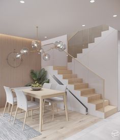 a dining room table with chairs next to a stair case and light fixture above it