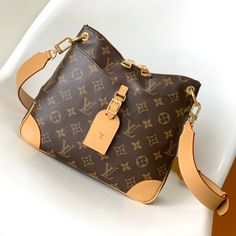 Louis Vuitton launched a new Odeon small handbag in the autumn and winter of 2020. The Monogram canvas is complemented by a zipper design with ample storage space, and the leather nameplate and reinforced leather corners continue the brand heritage. Adjustable shoulder strap for comfortable shoulder or cross-body wear.

Size: 24.0 x 22.0 x 8.0 cm (LxHxW)
• Monogram coated canvas
• Semi-aged calfskin trim
• Textile lining
• metallic parts
• Leather corners
• Double zip closure
• External Louis Vuitton Odeon Pm, New Louis Vuitton Handbags, Louis Vuitton Odeon, Cheap Louis Vuitton Bags, Louis Vuitton Yayoi Kusama, Cheap Louis Vuitton Handbags, Authentic Louis Vuitton Bags, Louis Vuitton Limited Edition, Large Cosmetic Bag